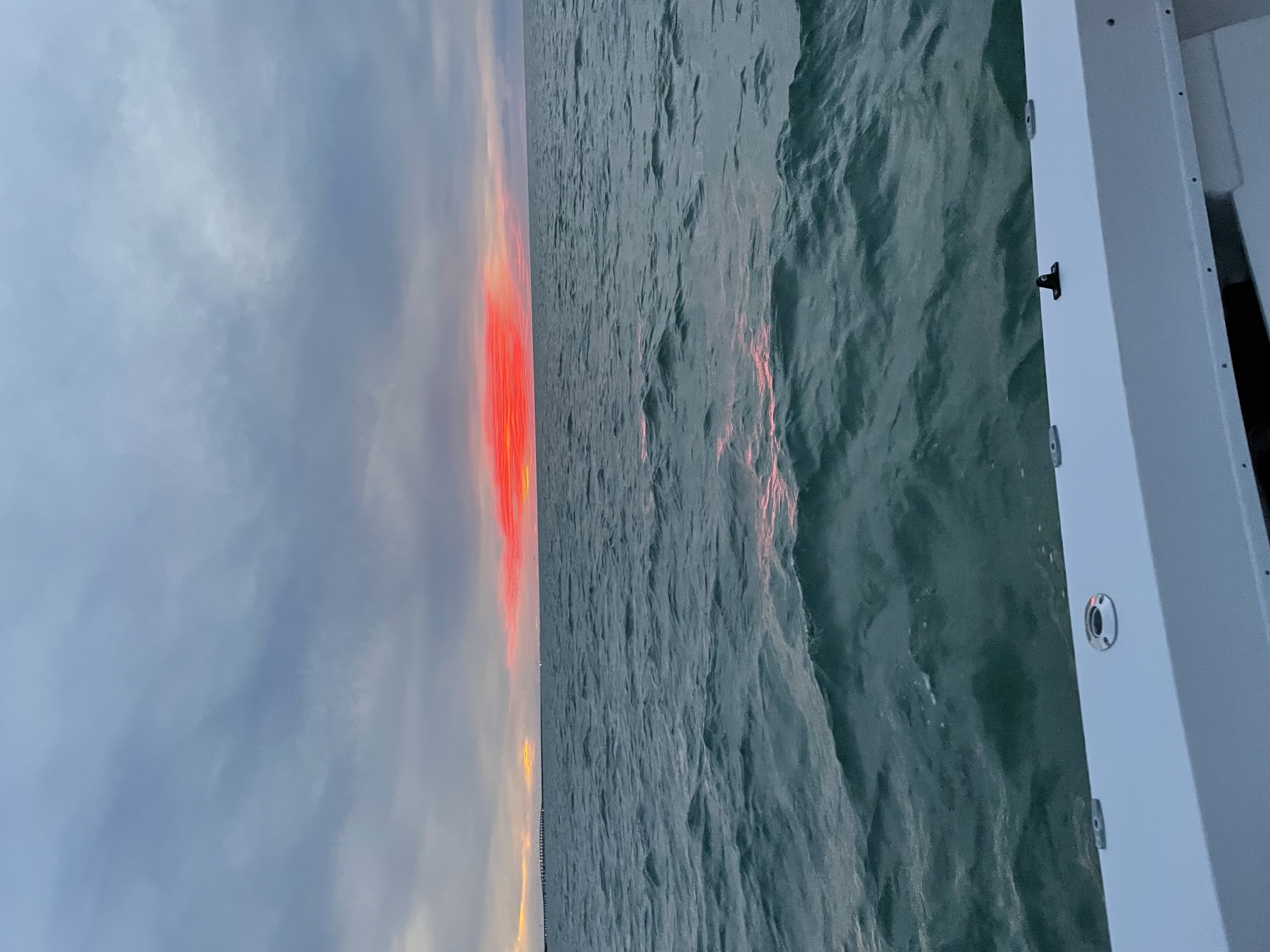 Couple enjoying sunset fishing